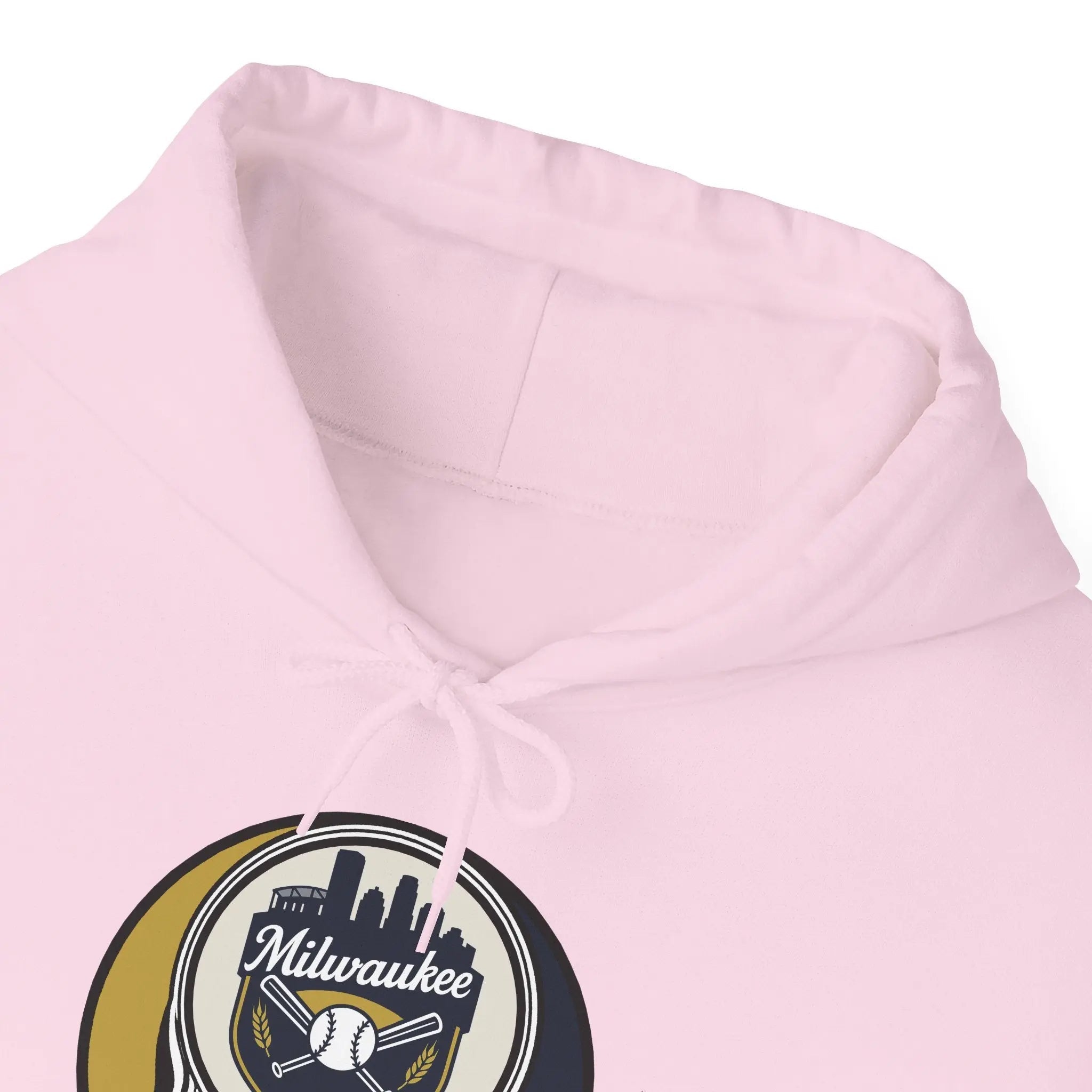 Light pink hoodie close-up of drawstring hood and Milwaukee logo patch