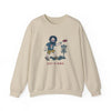 Sand crewneck sweatshirt with front cartoon disc-golf scene graphic