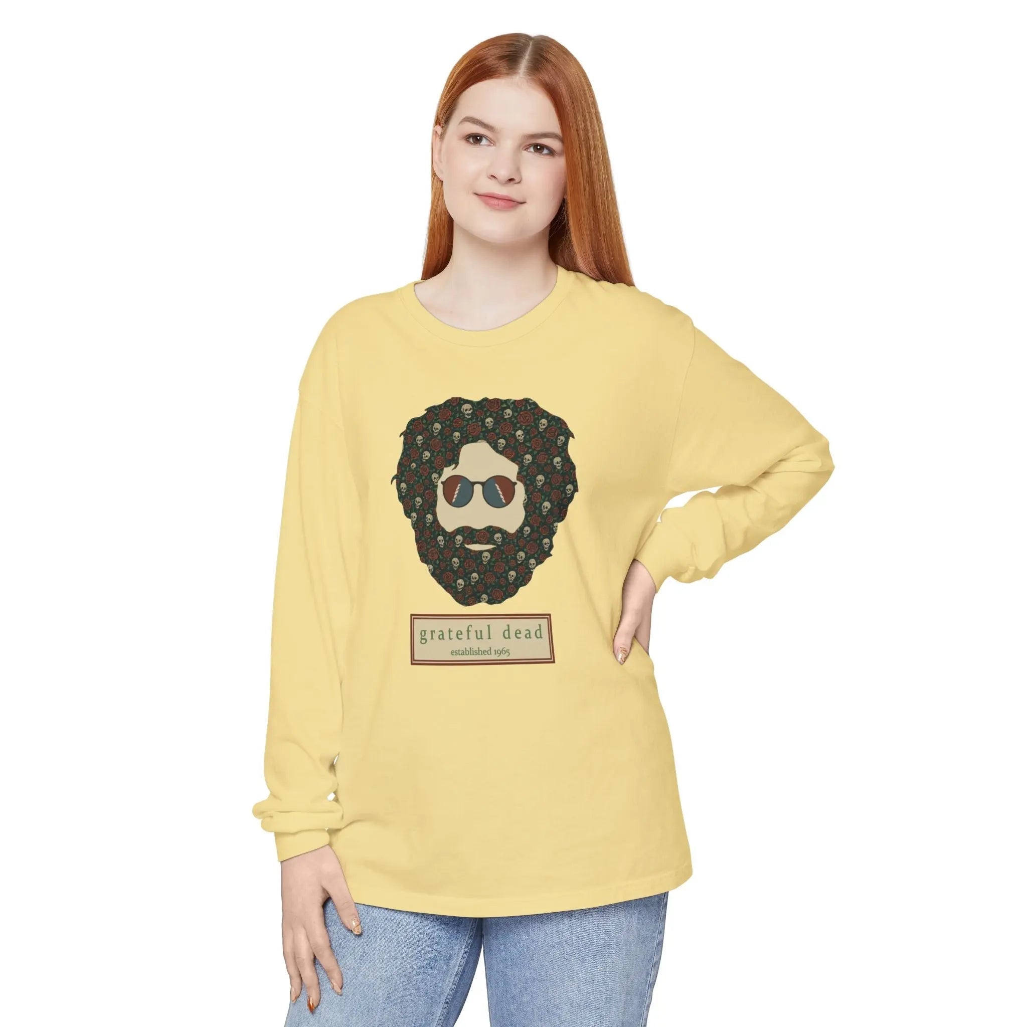 Garment-dyed long-sleeve T-shirt in butter yellow, with skull-face graphic on chest