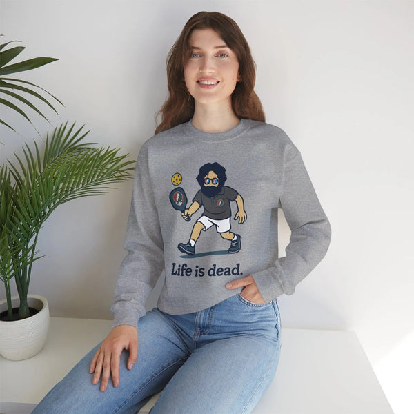 Light gray crewneck sweatshirt with cartoon graphic and slogan 'Life is dead.'