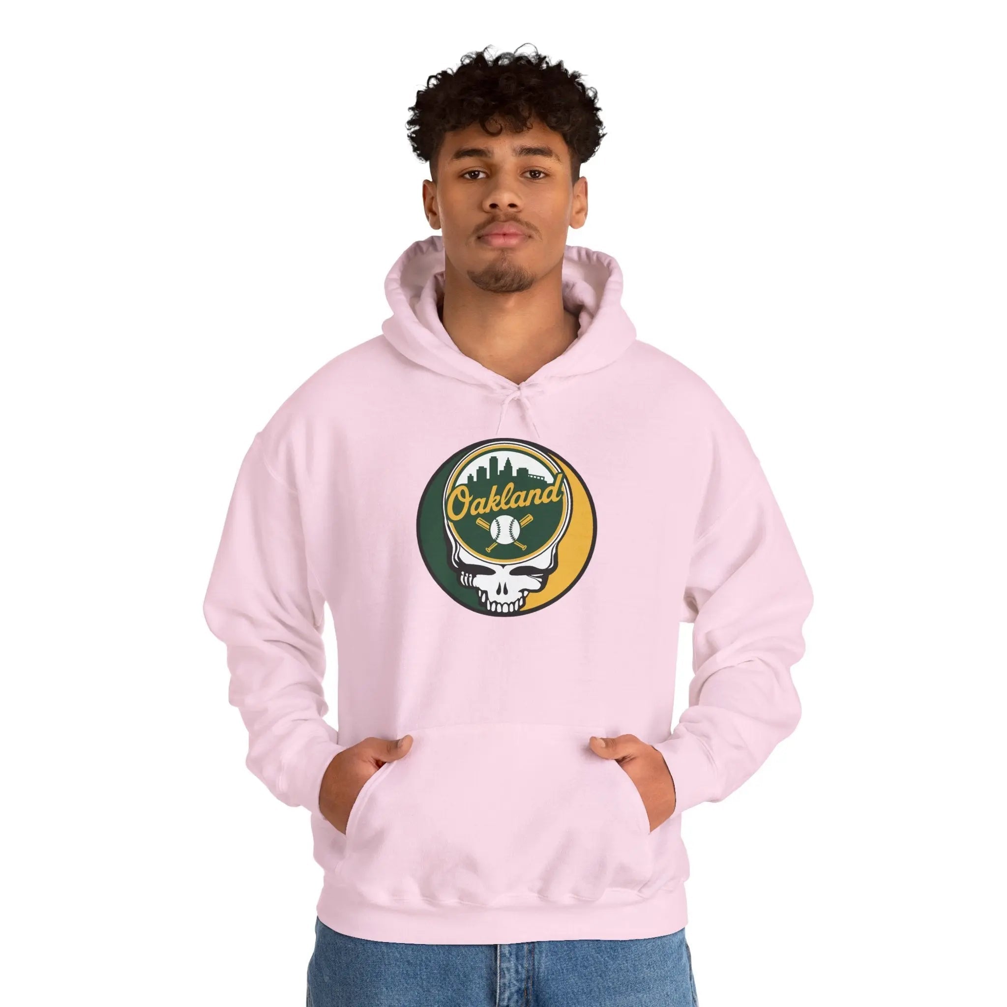Light pink hoodie with hood and front pouch pocket, Oakland logo skull baseball graphic.