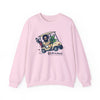 Light pink crewneck sweatshirt with centered front graphic, long sleeves