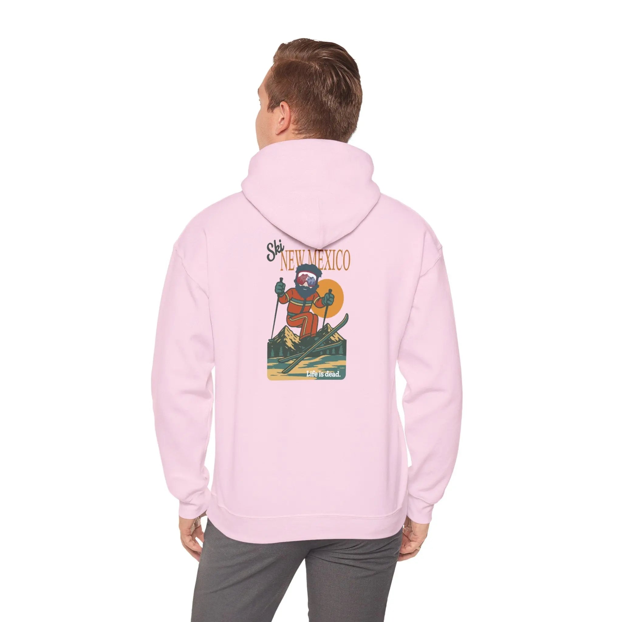 Light pink ski-themed hoodie with back graphic; hood and long sleeves