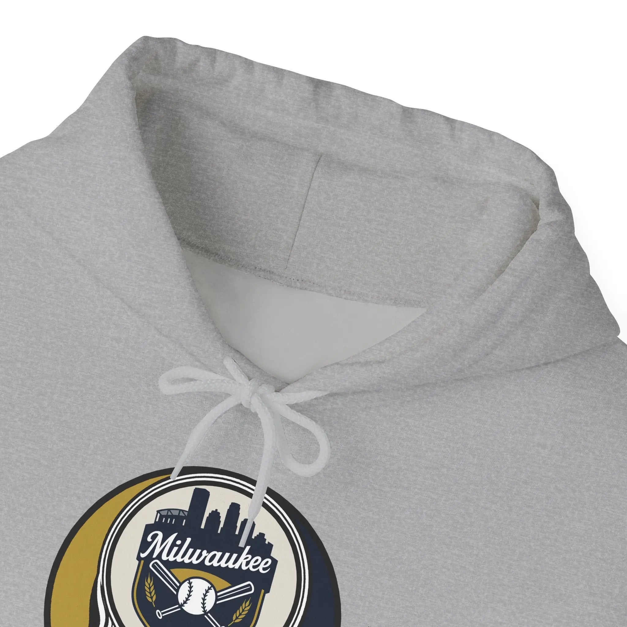 Light gray hoodie close-up of drawstring hood and Milwaukee logo patch