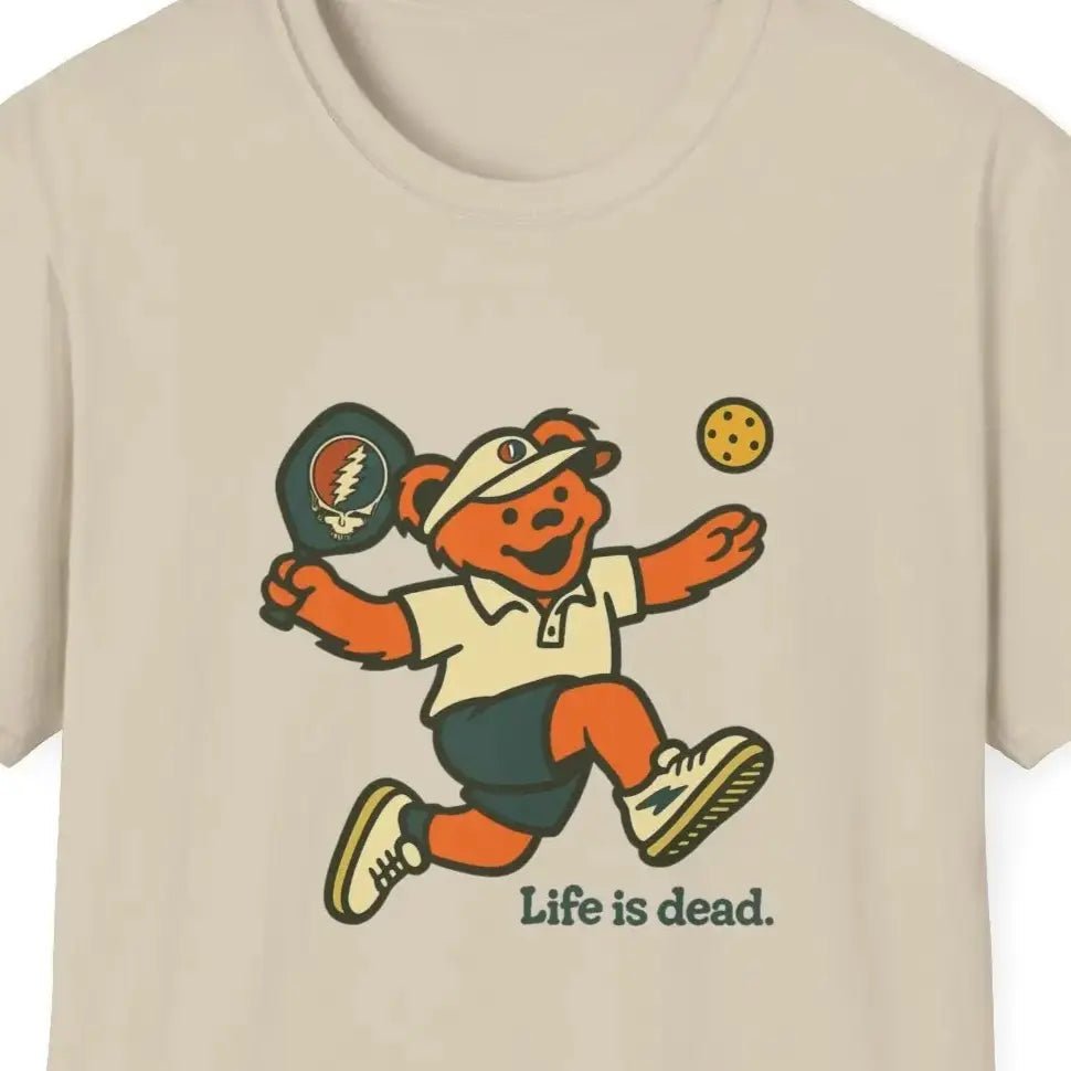 Sand crewneck t-shirt with running bear pickleball graphic and 'Life is dead.'