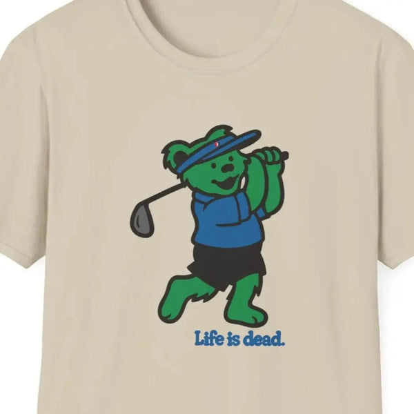 Sand graphic T-shirt with cartoon bear golfing and 'Life is dead.' print