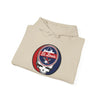 Beige hoodie folded with hood and front pocket; circular sports team logo on chest