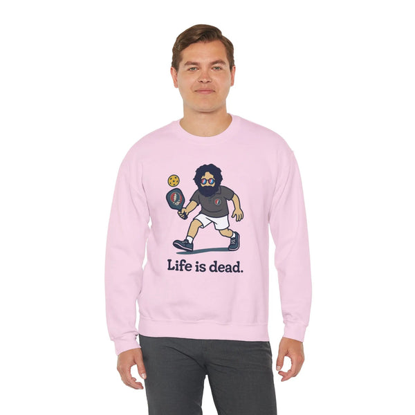 Light pink crewneck sweatshirt with cartoon character graphic and 'Life is dead,' modeled