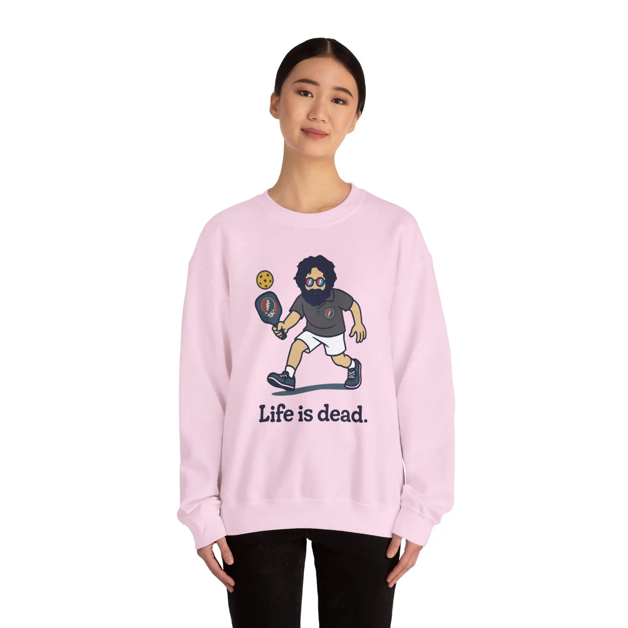 Light pink crewneck sweatshirt with cartoon character graphic and 'Life is dead.'