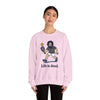 Light pink crewneck sweatshirt with cartoon character graphic and 'Life is dead.'