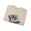 Light sand crewneck sweatshirt flat lay with cartoon car-and-characters graphic