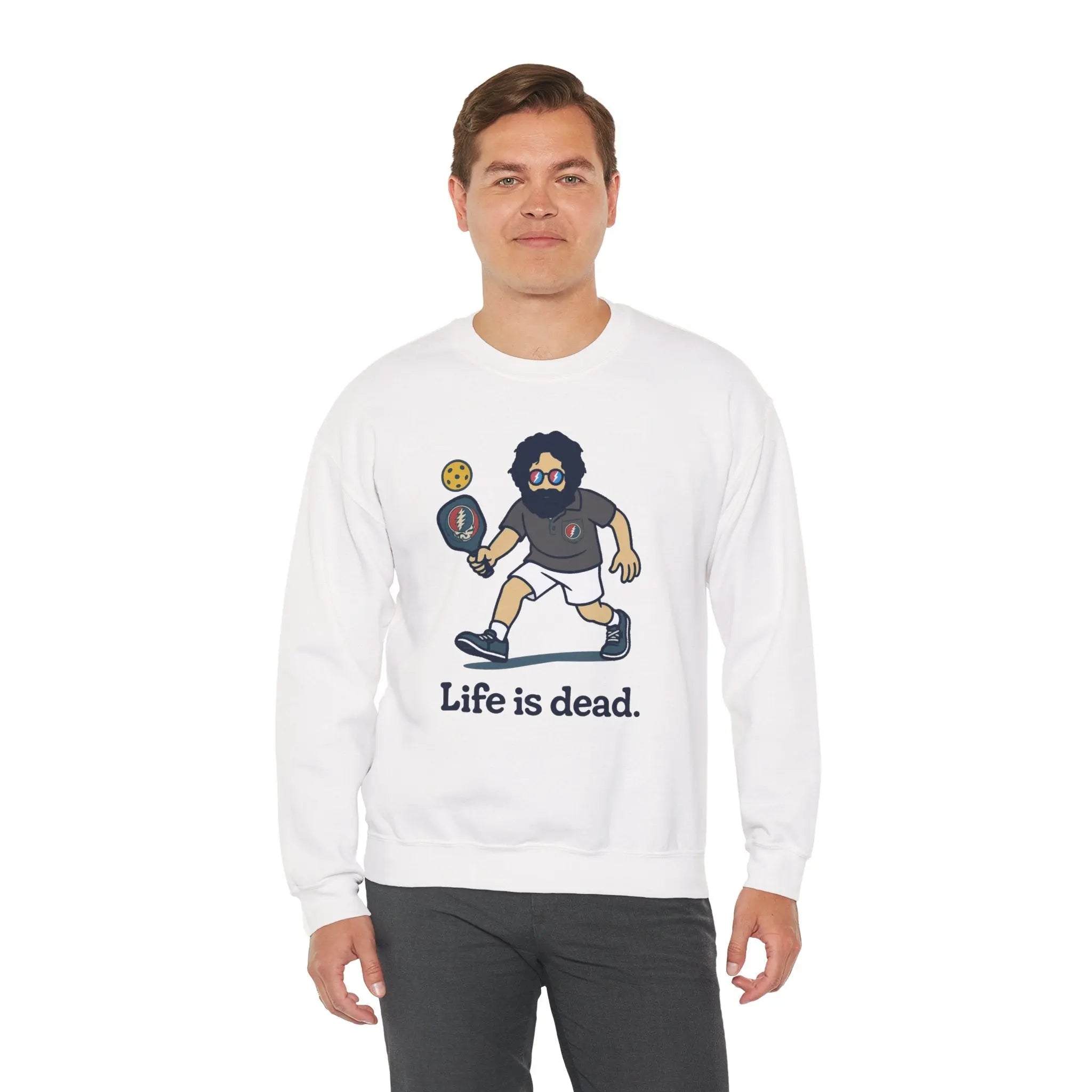 White crewneck sweatshirt on model, featuring cartoon graphic and 