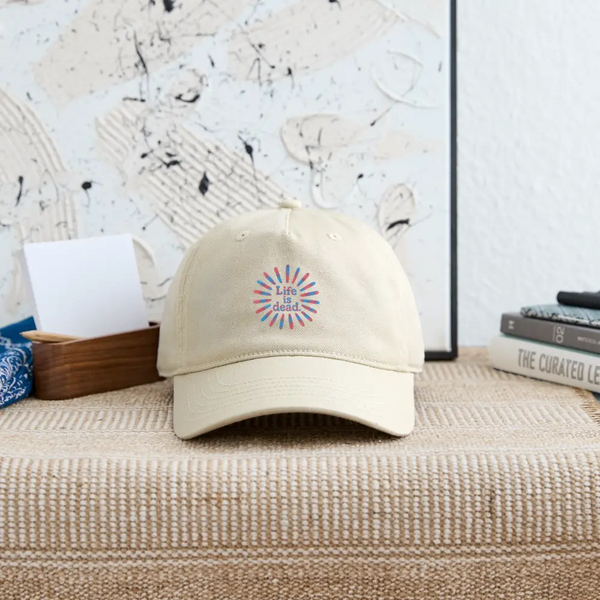 Khaki dad hat with Life is Dead rainbow sunburst logo on front