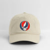 Khaki dad hat with front lightning skull logo, low-profile crown and curved brim