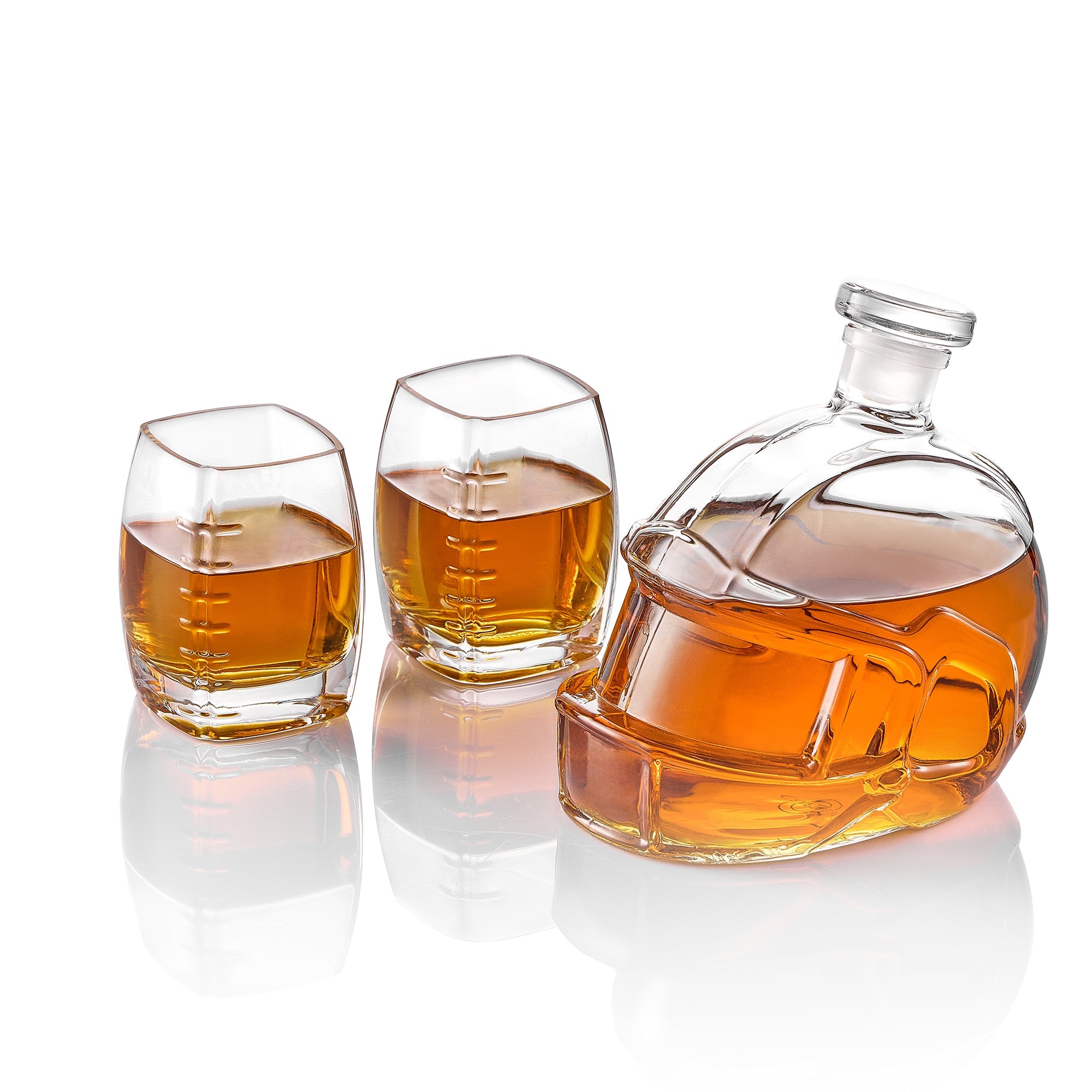 Football-shaped whiskey decanter with three amber tumblers