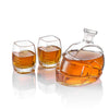 Football-shaped whiskey decanter with three amber tumblers