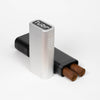 Aluminum cigar case with black tube holding two cigars