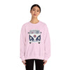 Light pink crewneck sweatshirt with blue bus graphic