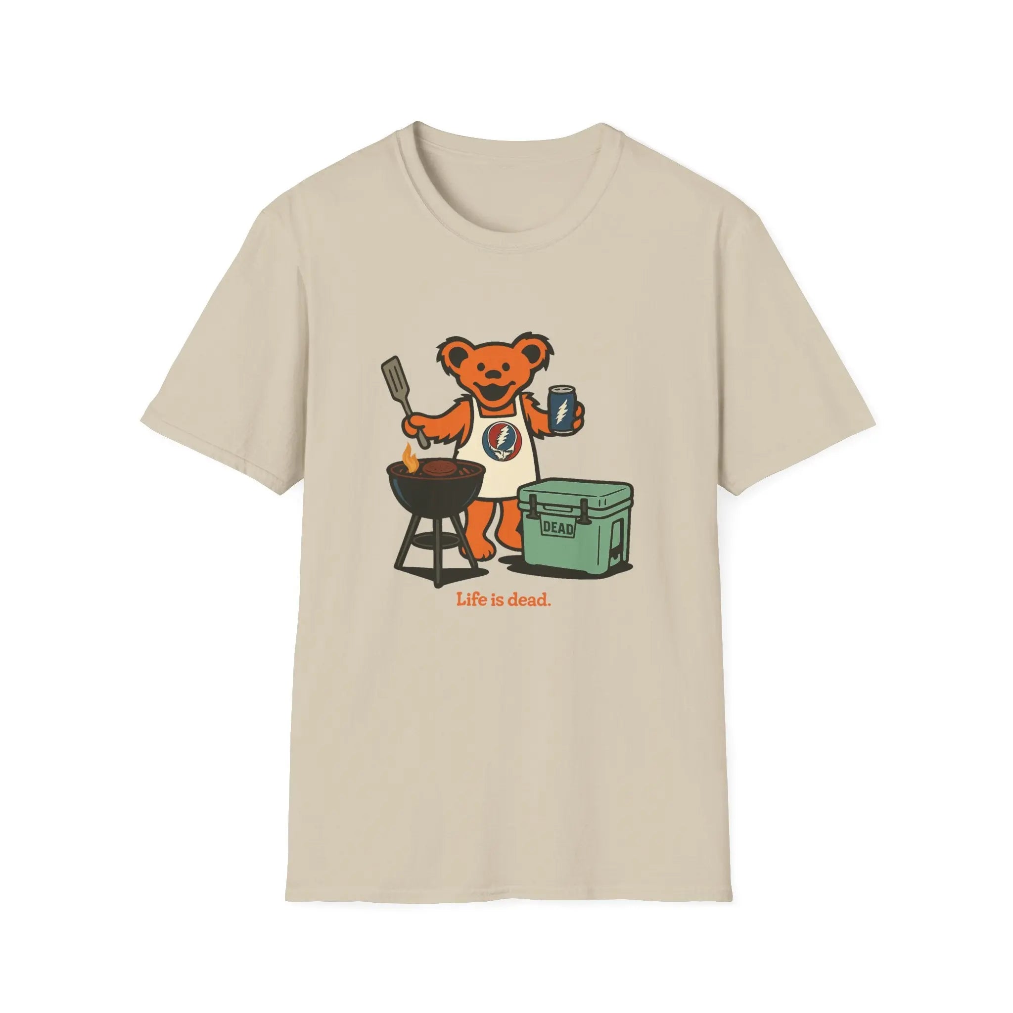 Beige T-shirt with cartoon bear grilling graphic and small text at bottom