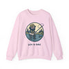 Light pink crewneck sweatshirt with round fishing character graphic and 'Life is dead.'