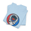 Light blue crewneck graphic T-shirt with circular skull logo on the chest