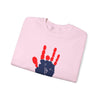Light pink crewneck sweatshirt with red and blue handprint graphic on the chest