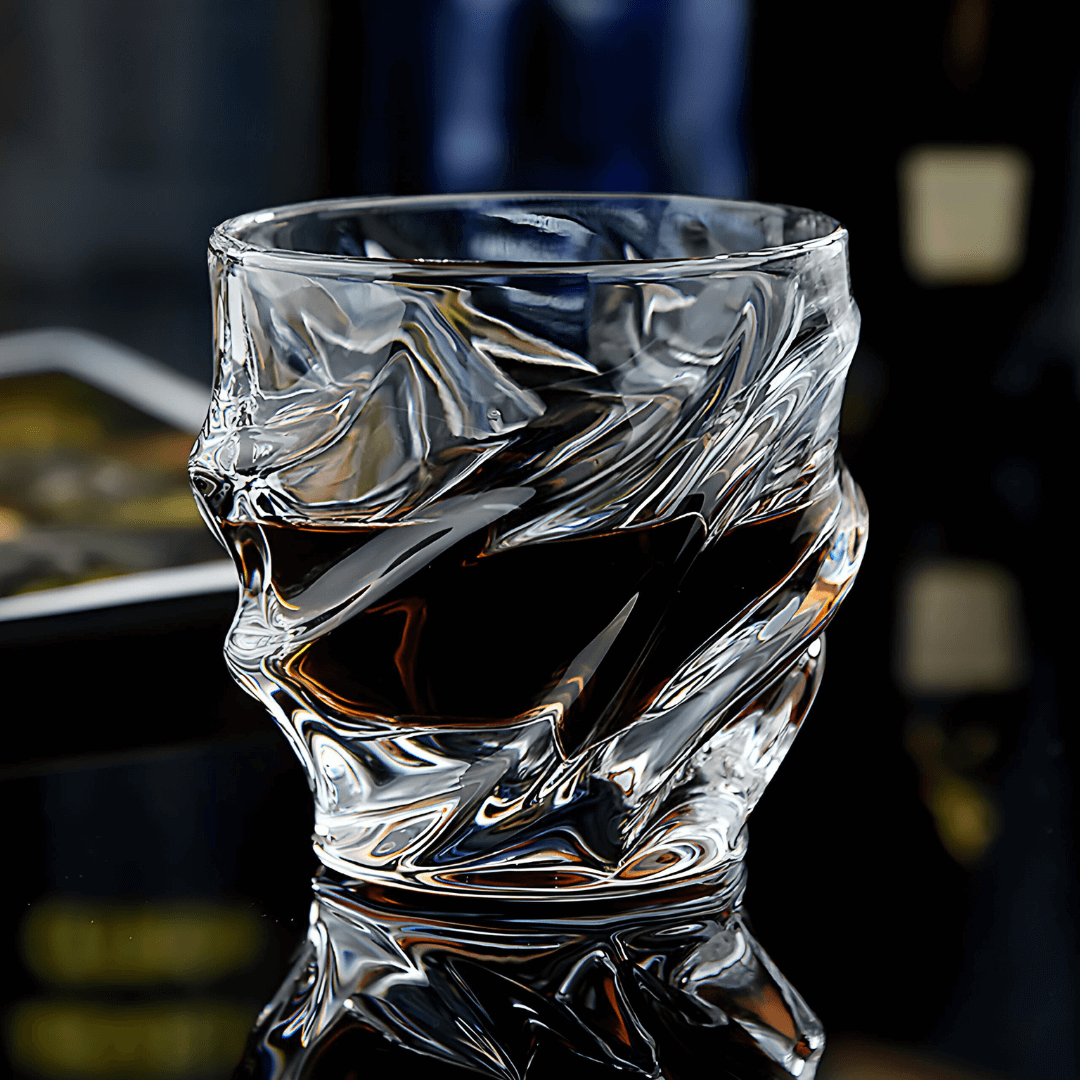 Crystal whisky glass with faceted wave pattern and thick rounded rim