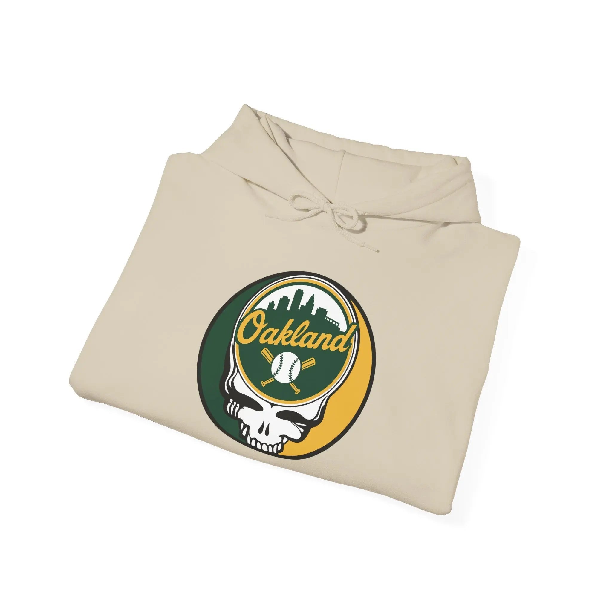 Folded beige hoodie with drawstring hood and Oakland logo skull baseball graphic.