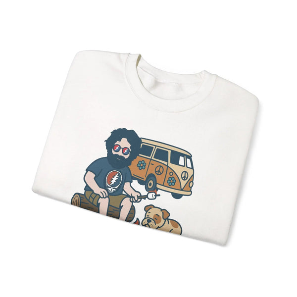 White crewneck sweatshirt, folded, with camping character graphic on the front.