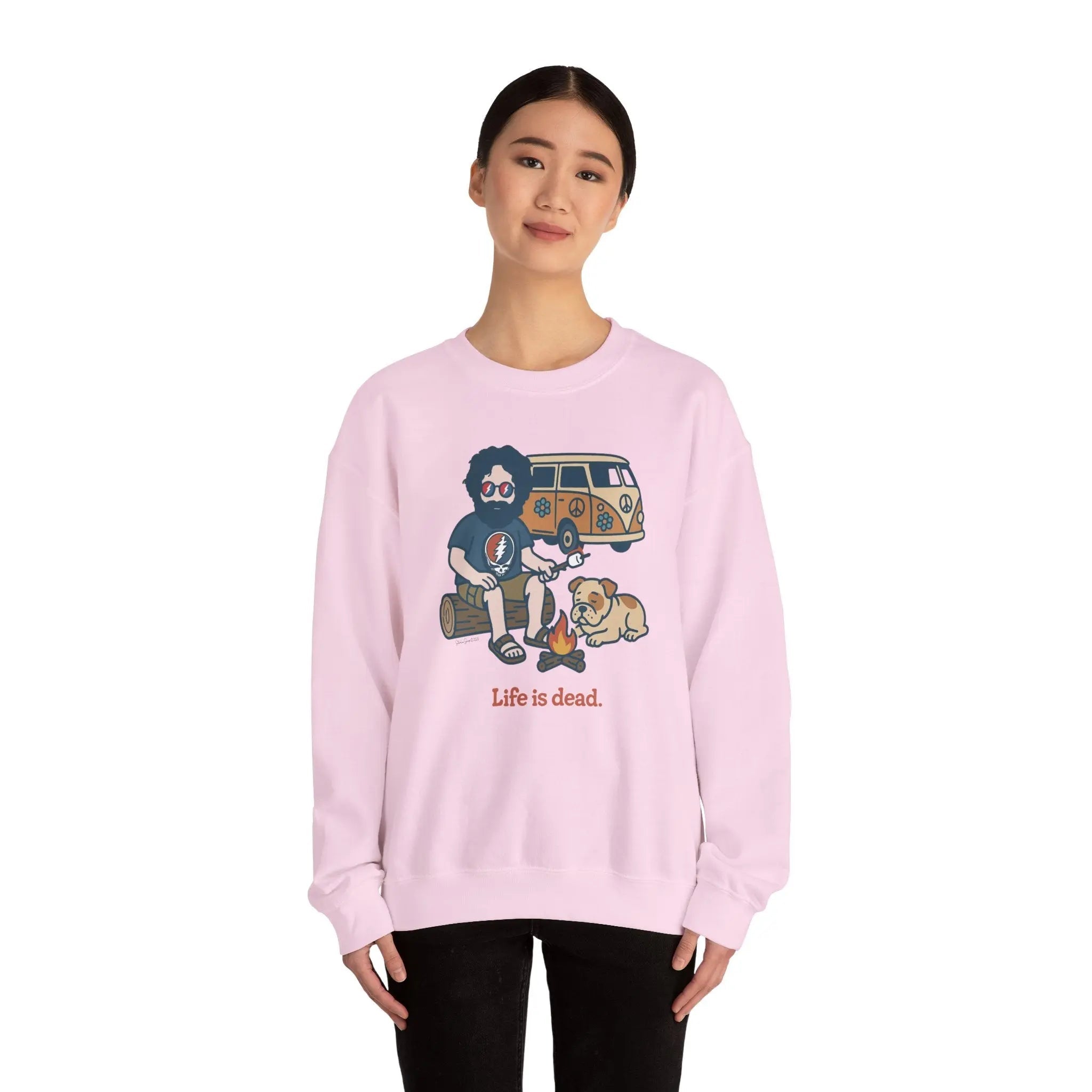 Unisex camping sweatshirt in light pink with illustrated camper, dog, and skull graphic