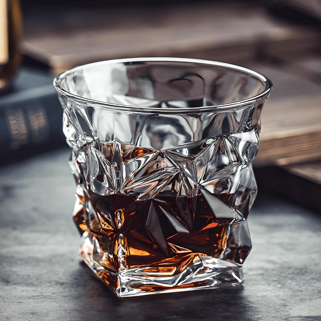 Clear and amber faceted Japanese crystal whisky tumbler with angular pattern