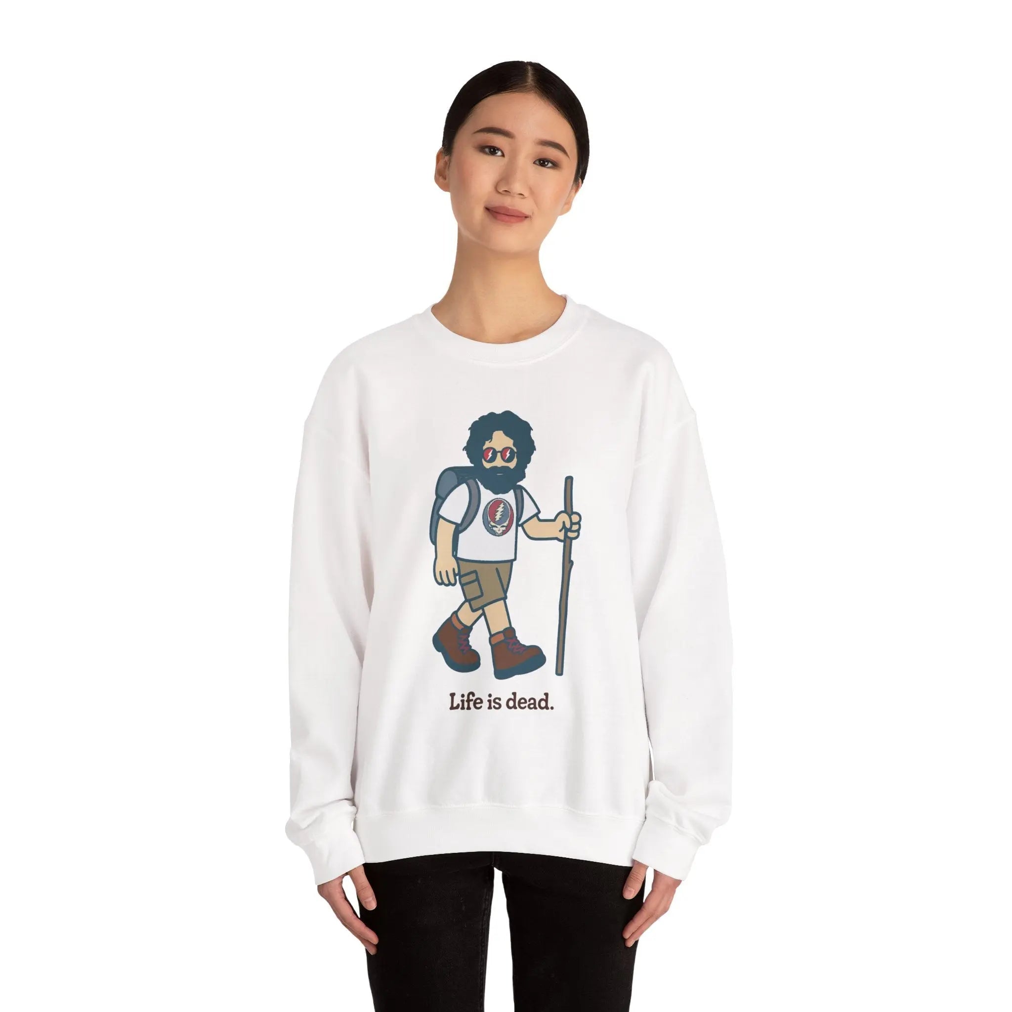 White crewneck sweatshirt on model, long sleeves and bearded hiking graphic