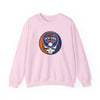 Light pink crewneck sweatshirt with circular New York graphic logo on chest.