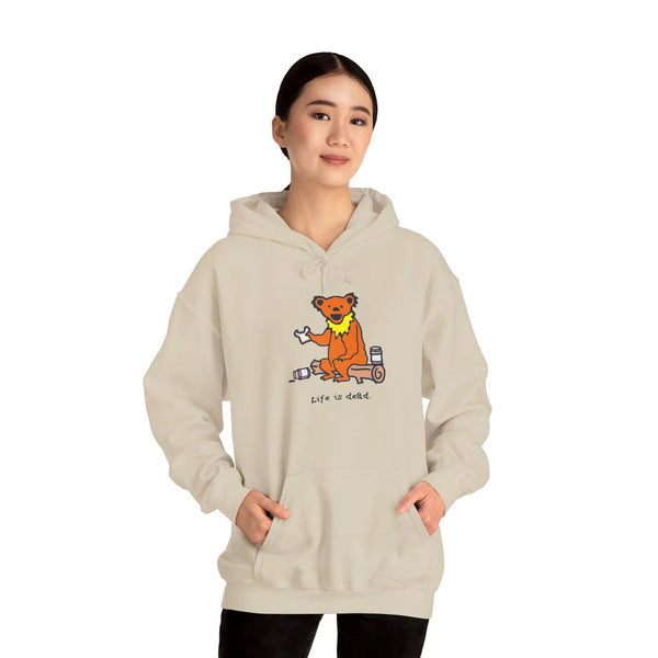 Cream bear graphic pullover hoodie with front pocket and drawstring hood