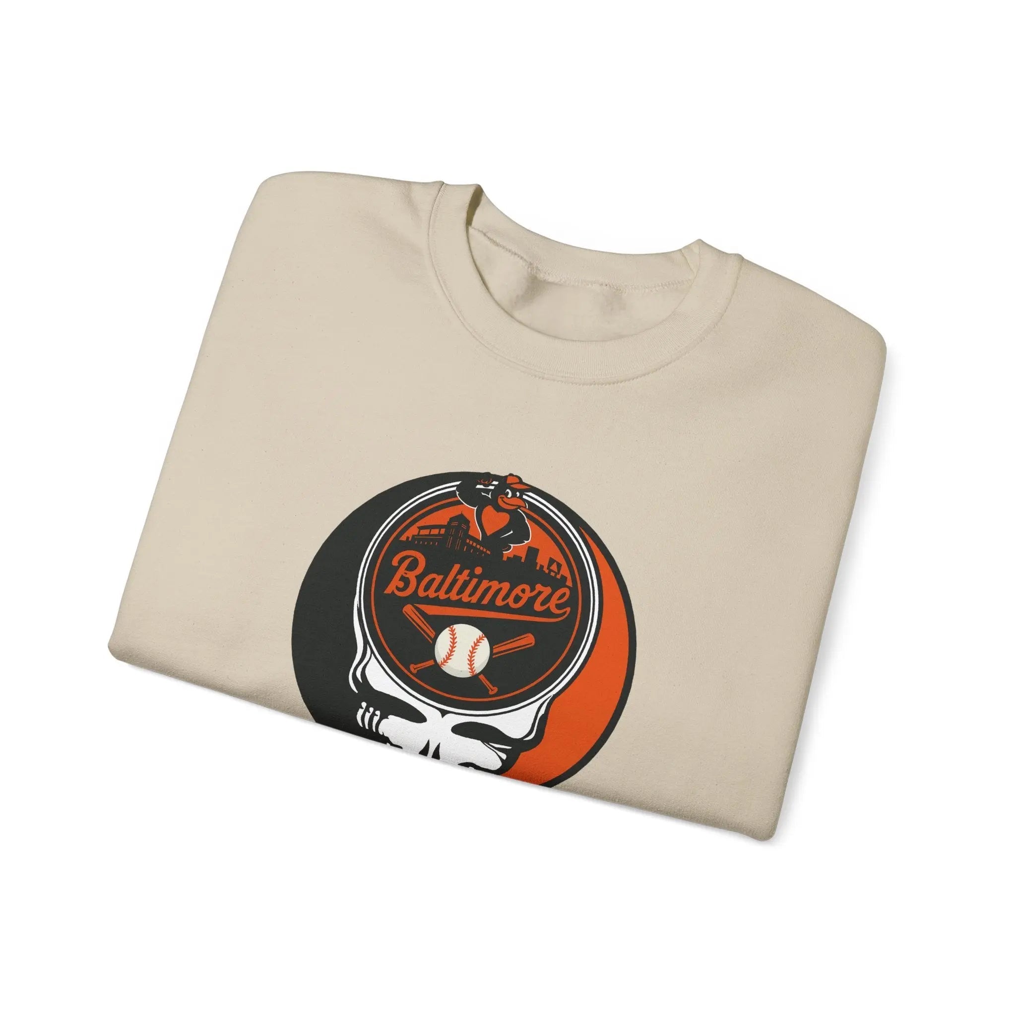 Baltimore Orioles crewneck sweatshirt in tan, folded view, front skull logo graphic