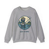 Light gray crewneck sweatshirt with cartoon fly-fishing graphic on chest