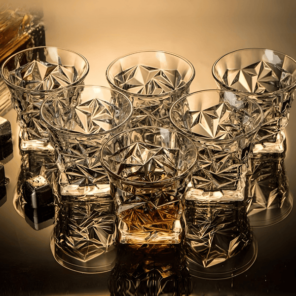 Set of crystal whisky tumblers with star and diamond cut facets