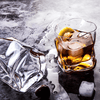 Hoshi Japanese crystal whisky glass with amber whisky and thick base, plus another glass