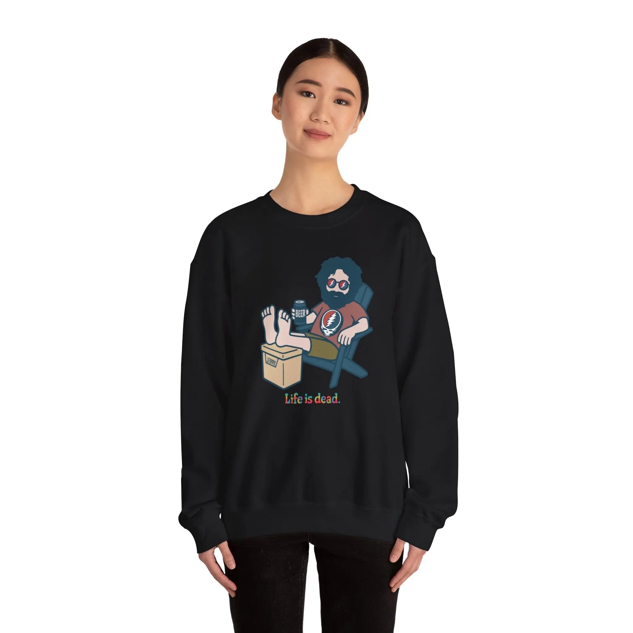 Black crewneck sweatshirt worn by model, cartoon graphic on chest