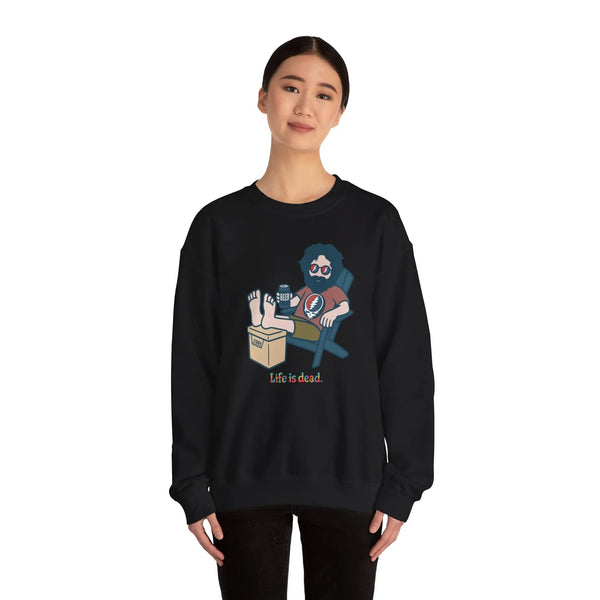 Black crewneck sweatshirt worn by model, cartoon graphic on chest