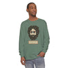 Garment-dyed long-sleeve T-shirt in light green, with skull-face graphic on chest