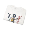 White crewneck sweatshirt folded, featuring band graphic print
