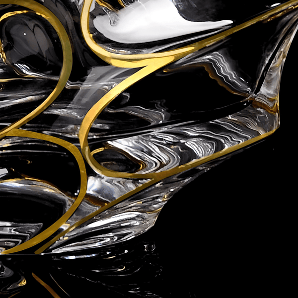 Close-up bottom view of Japanese crystal whisky glass with gold line accents