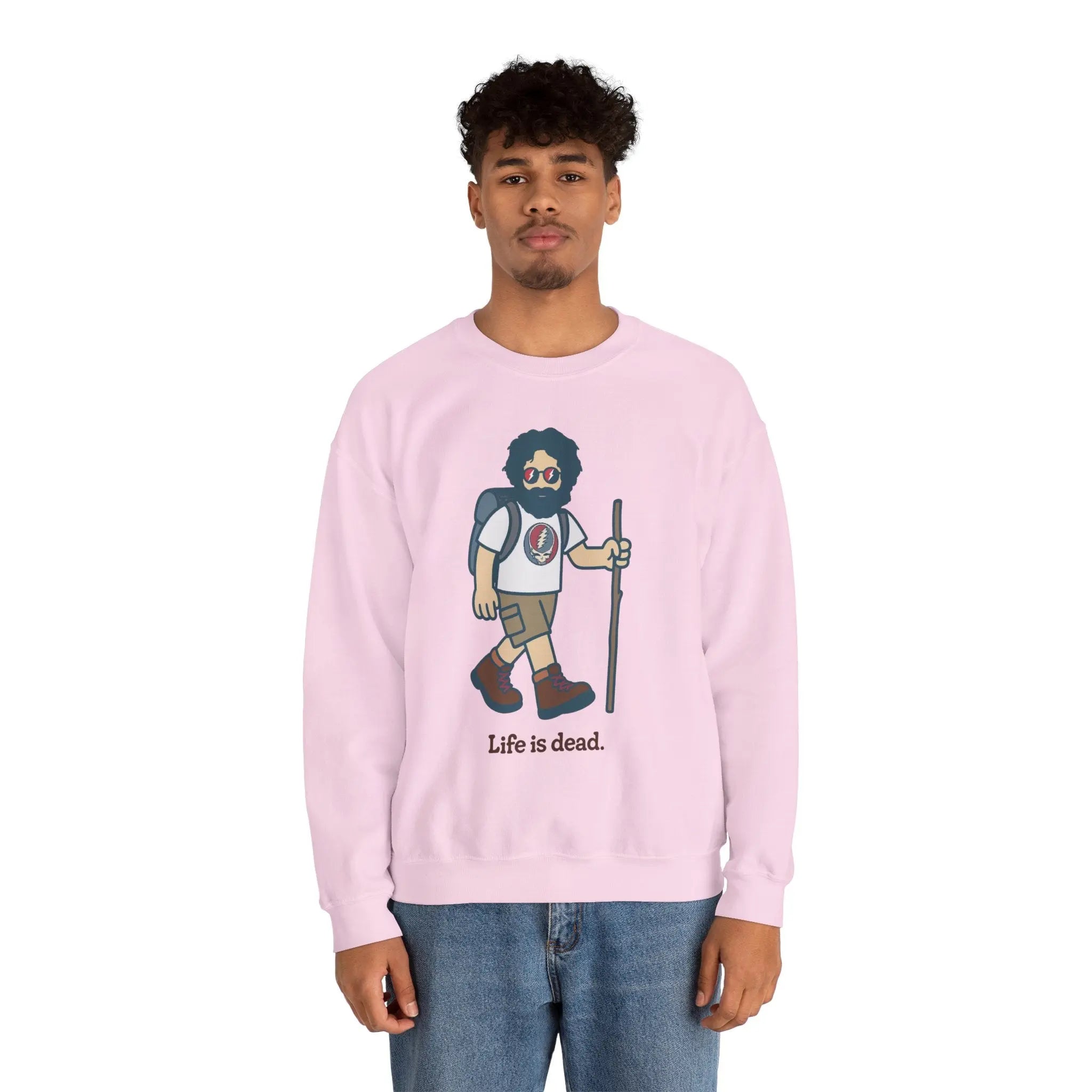 Light pink crewneck sweatshirt with hiker character graphic, model wearing