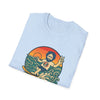 Light blue T-shirt with front graphic of a bearded man in a circular orange scene