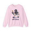 Light pink crewneck sweatshirt with cartoon character graphic and 'Life is dead.'