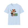 Light blue T-shirt with cartoon bear grilling graphic and small text at bottom