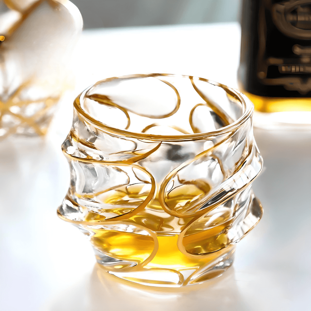 Japanese crystal whisky glass with gold line swirl pattern, clear body