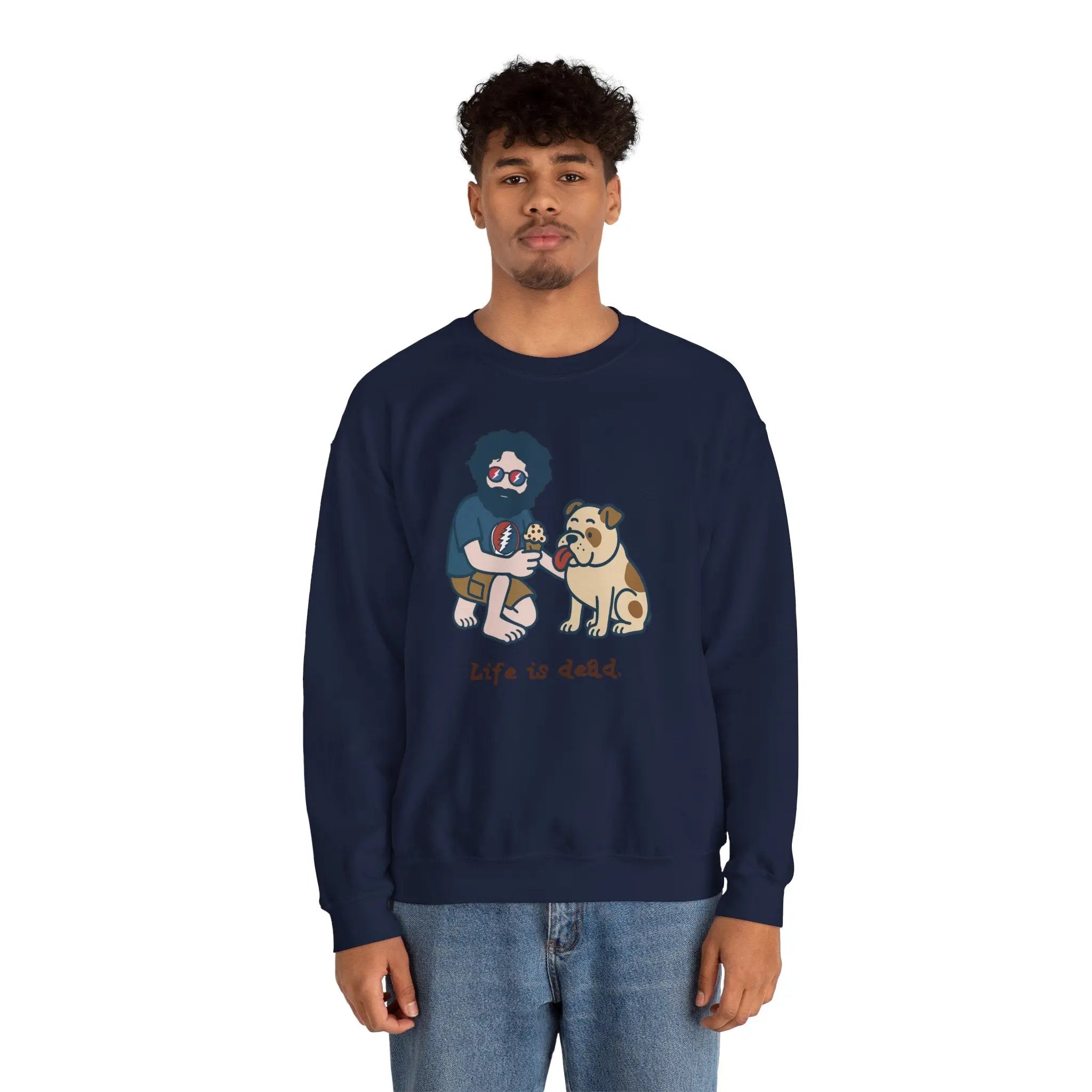 Navy crewneck sweatshirt with front cartoon graphic; worn by a male model