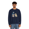 Navy crewneck sweatshirt with front cartoon graphic; worn by a male model